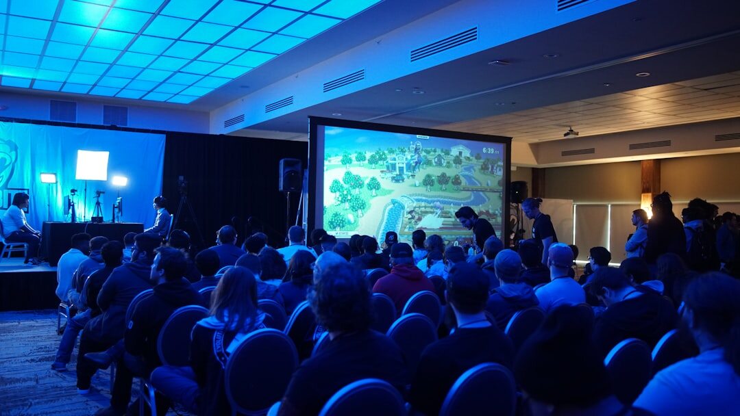 Technology summit with large LED screens and audience